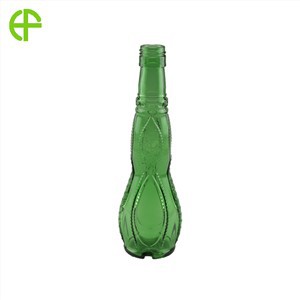 Oliiviöljy lasipulloissa